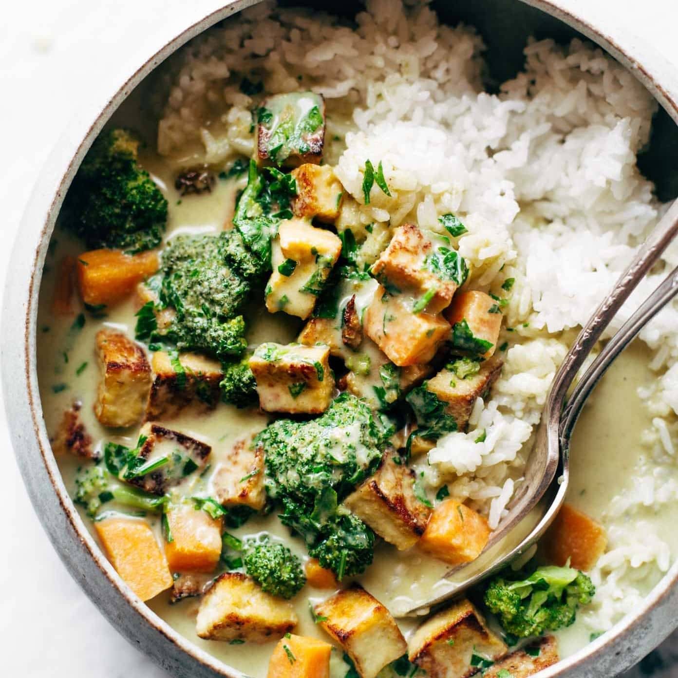 Green Curry in bowl with spoon.