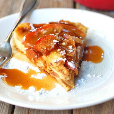 A picture of Baked Apple Pancake with Apple Cider Syrup